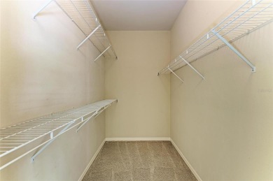 Discover the charm and convenience of this delightful two-story on University Park Country Club in Florida - for sale on GolfHomes.com, golf home, golf lot