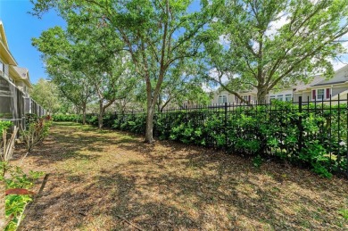Discover the charm and convenience of this delightful two-story on University Park Country Club in Florida - for sale on GolfHomes.com, golf home, golf lot