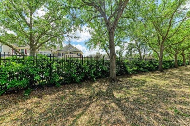 Discover the charm and convenience of this delightful two-story on University Park Country Club in Florida - for sale on GolfHomes.com, golf home, golf lot