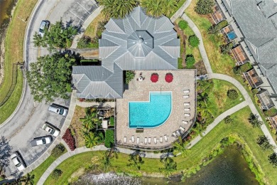 Discover the charm and convenience of this delightful two-story on University Park Country Club in Florida - for sale on GolfHomes.com, golf home, golf lot