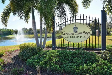 Discover the charm and convenience of this delightful two-story on University Park Country Club in Florida - for sale on GolfHomes.com, golf home, golf lot