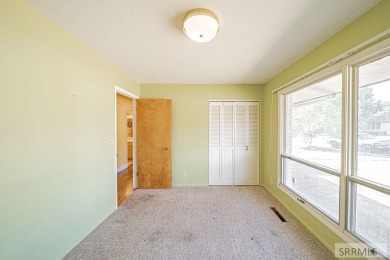 Nestled on a spacious 0.43-acre corner lot along the fairways of on  in Idaho - for sale on GolfHomes.com, golf home, golf lot