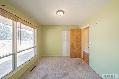 Nestled on a spacious 0.43-acre corner lot along the fairways of on  in Idaho - for sale on GolfHomes.com, golf home, golf lot