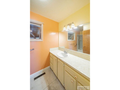Nestled on a spacious 0.43-acre corner lot along the fairways of on  in Idaho - for sale on GolfHomes.com, golf home, golf lot