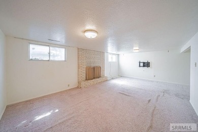 Nestled on a spacious 0.43-acre corner lot along the fairways of on  in Idaho - for sale on GolfHomes.com, golf home, golf lot