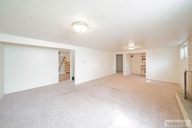 Nestled on a spacious 0.43-acre corner lot along the fairways of on  in Idaho - for sale on GolfHomes.com, golf home, golf lot