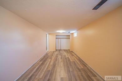 Nestled on a spacious 0.43-acre corner lot along the fairways of on  in Idaho - for sale on GolfHomes.com, golf home, golf lot