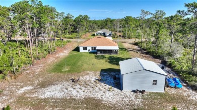 Better Than New! Stunning Home in Indian Lake Estates! Located on Indian Lake Estates Golf and Country Club in Florida - for sale on GolfHomes.com, golf home, golf lot