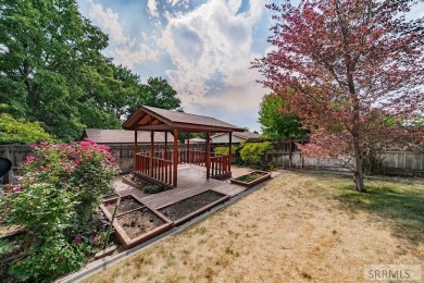 Nestled on a spacious 0.43-acre corner lot along the fairways of on  in Idaho - for sale on GolfHomes.com, golf home, golf lot