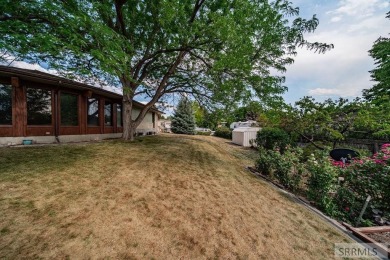 Nestled on a spacious 0.43-acre corner lot along the fairways of on  in Idaho - for sale on GolfHomes.com, golf home, golf lot