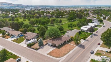 Nestled on a spacious 0.43-acre corner lot along the fairways of on  in Idaho - for sale on GolfHomes.com, golf home, golf lot