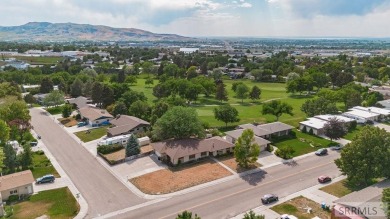 Nestled on a spacious 0.43-acre corner lot along the fairways of on  in Idaho - for sale on GolfHomes.com, golf home, golf lot
