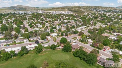 Nestled on a spacious 0.43-acre corner lot along the fairways of on  in Idaho - for sale on GolfHomes.com, golf home, golf lot