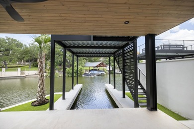 Experience unparalleled luxury living in this stunning on Slick Rock Golf Course - Horseshoe Bay in Texas - for sale on GolfHomes.com, golf home, golf lot