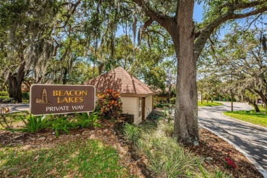 AFFORDABLE ~ 55+ MAINTENANCE FREE ~ TROPICAL SETTING ~ EXCELLENT on Gulf Harbors Golf Course in Florida - for sale on GolfHomes.com, golf home, golf lot