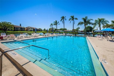 AFFORDABLE ~ 55+ MAINTENANCE FREE ~ TROPICAL SETTING ~ EXCELLENT on Gulf Harbors Golf Course in Florida - for sale on GolfHomes.com, golf home, golf lot