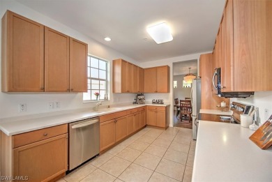 Step into luxury living with this pristine 2nd floor condo that on Shadow Wood Preserve in Florida - for sale on GolfHomes.com, golf home, golf lot