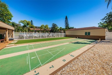 AFFORDABLE ~ 55+ MAINTENANCE FREE ~ TROPICAL SETTING ~ EXCELLENT on Gulf Harbors Golf Course in Florida - for sale on GolfHomes.com, golf home, golf lot