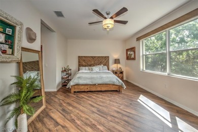 Step into luxury living with this pristine 2nd floor condo that on Shadow Wood Preserve in Florida - for sale on GolfHomes.com, golf home, golf lot