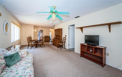 AFFORDABLE ~ 55+ MAINTENANCE FREE ~ TROPICAL SETTING ~ EXCELLENT on Gulf Harbors Golf Course in Florida - for sale on GolfHomes.com, golf home, golf lot