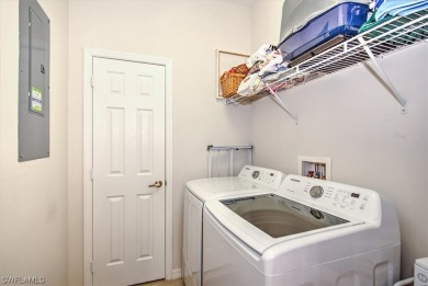 Step into luxury living with this pristine 2nd floor condo that on Shadow Wood Preserve in Florida - for sale on GolfHomes.com, golf home, golf lot