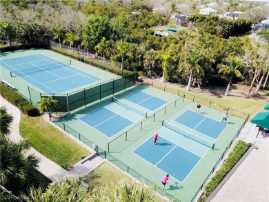 Step into luxury living with this pristine 2nd floor condo that on Shadow Wood Preserve in Florida - for sale on GolfHomes.com, golf home, golf lot