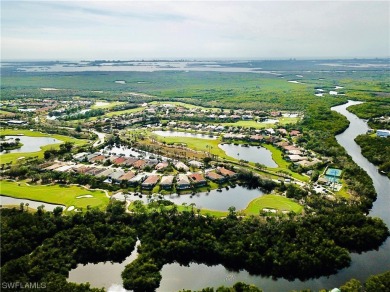 Step into luxury living with this pristine 2nd floor condo that on Shadow Wood Preserve in Florida - for sale on GolfHomes.com, golf home, golf lot