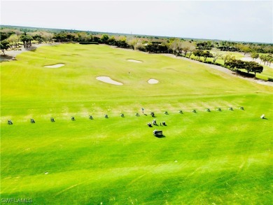 Step into luxury living with this pristine 2nd floor condo that on Shadow Wood Preserve in Florida - for sale on GolfHomes.com, golf home, golf lot