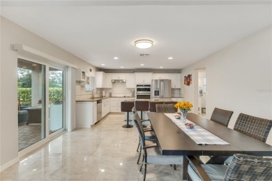 Fall in love with this stunning home nestled in the prestigious on Eagle Creek Golf Club in Florida - for sale on GolfHomes.com, golf home, golf lot