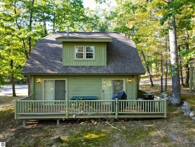 This charming cottage-style property at Garland Lodge and Golf on Garland Resort and Golf Club  in Michigan - for sale on GolfHomes.com, golf home, golf lot