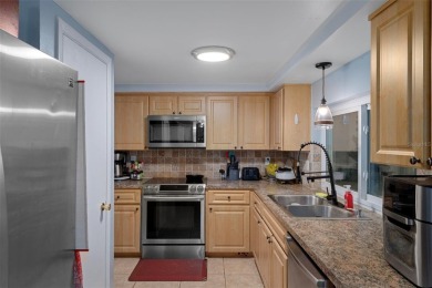 Short Sale. This Gorgeous Home is a repaired sinkhole property on Beacon Woods Golf Club in Florida - for sale on GolfHomes.com, golf home, golf lot