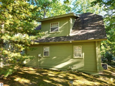 This charming cottage-style property at Garland Lodge and Golf on Garland Resort and Golf Club  in Michigan - for sale on GolfHomes.com, golf home, golf lot