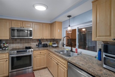 Short Sale. This Gorgeous Home is a repaired sinkhole property on Beacon Woods Golf Club in Florida - for sale on GolfHomes.com, golf home, golf lot