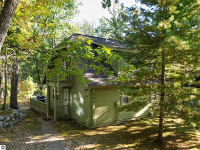 This charming cottage-style property at Garland Lodge and Golf on Garland Resort and Golf Club  in Michigan - for sale on GolfHomes.com, golf home, golf lot