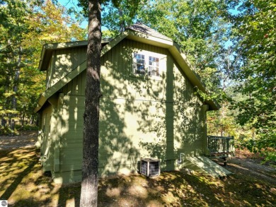 This charming cottage-style property at Garland Lodge and Golf on Garland Resort and Golf Club  in Michigan - for sale on GolfHomes.com, golf home, golf lot