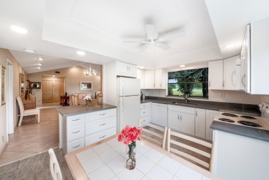 Welcome to this beautifully maintained 2-bedroom, 2.5-bathroom on Indian Spring Golf and Country Club in Florida - for sale on GolfHomes.com, golf home, golf lot