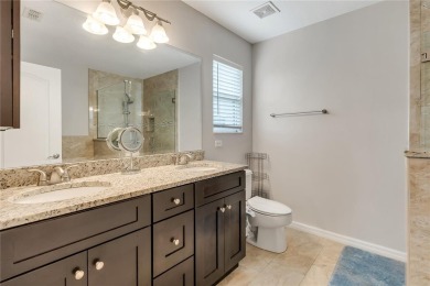 Fall in love with this stunning home nestled in the prestigious on Eagle Creek Golf Club in Florida - for sale on GolfHomes.com, golf home, golf lot