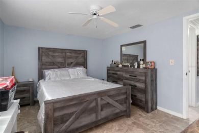 Short Sale. This Gorgeous Home is a repaired sinkhole property on Beacon Woods Golf Club in Florida - for sale on GolfHomes.com, golf home, golf lot