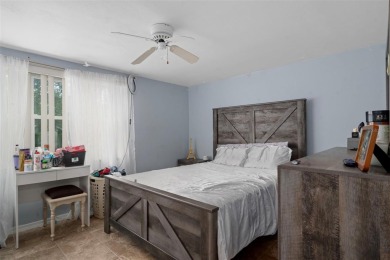 Short Sale. This Gorgeous Home is a repaired sinkhole property on Beacon Woods Golf Club in Florida - for sale on GolfHomes.com, golf home, golf lot