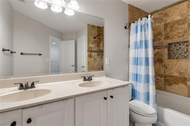 Fall in love with this stunning home nestled in the prestigious on Eagle Creek Golf Club in Florida - for sale on GolfHomes.com, golf home, golf lot