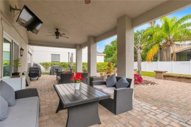 Fall in love with this stunning home nestled in the prestigious on Eagle Creek Golf Club in Florida - for sale on GolfHomes.com, golf home, golf lot