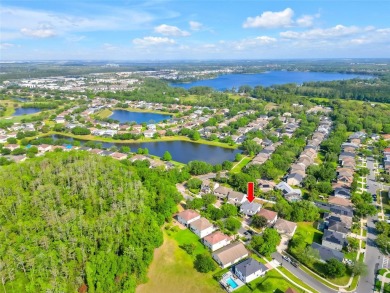 Fall in love with this stunning home nestled in the prestigious on Eagle Creek Golf Club in Florida - for sale on GolfHomes.com, golf home, golf lot