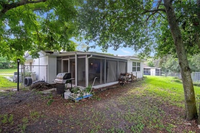 Short Sale. This Gorgeous Home is a repaired sinkhole property on Beacon Woods Golf Club in Florida - for sale on GolfHomes.com, golf home, golf lot