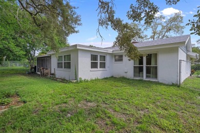 Short Sale. This Gorgeous Home is a repaired sinkhole property on Beacon Woods Golf Club in Florida - for sale on GolfHomes.com, golf home, golf lot