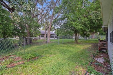 Short Sale. This Gorgeous Home is a repaired sinkhole property on Beacon Woods Golf Club in Florida - for sale on GolfHomes.com, golf home, golf lot