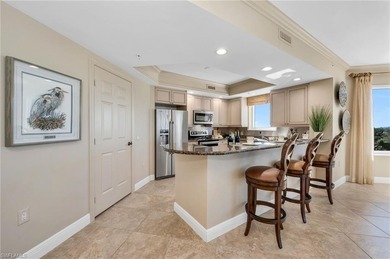 This exquisite residence boasts breathtaking views of the golf on The Colony Golf and Country Club in Florida - for sale on GolfHomes.com, golf home, golf lot