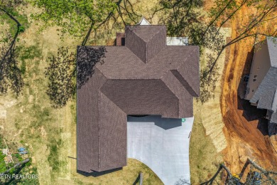 Welcome to a luxurious retreat that sits on Lot 6 of the on Dandridge Golf and Country Club in Tennessee - for sale on GolfHomes.com, golf home, golf lot