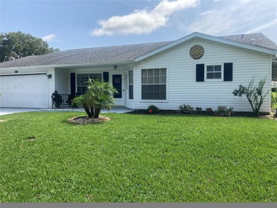 You will get many years of delight out of this lovely home on an on Plantation Golf Club in Florida - for sale on GolfHomes.com, golf home, golf lot
