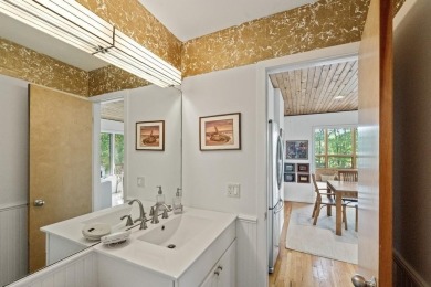 Located just moments from Sag Harbor Village and set alongside on Noyac Golf Club in New York - for sale on GolfHomes.com, golf home, golf lot