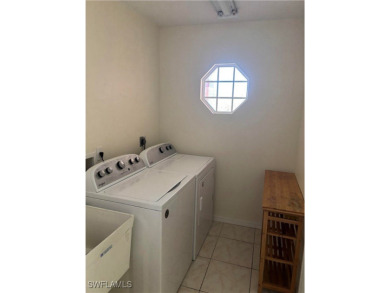 Price Reduced. Welcome to this beautiful 3-bedroom, 2-bath home on Mirror Lakes Golf Club in Florida - for sale on GolfHomes.com, golf home, golf lot